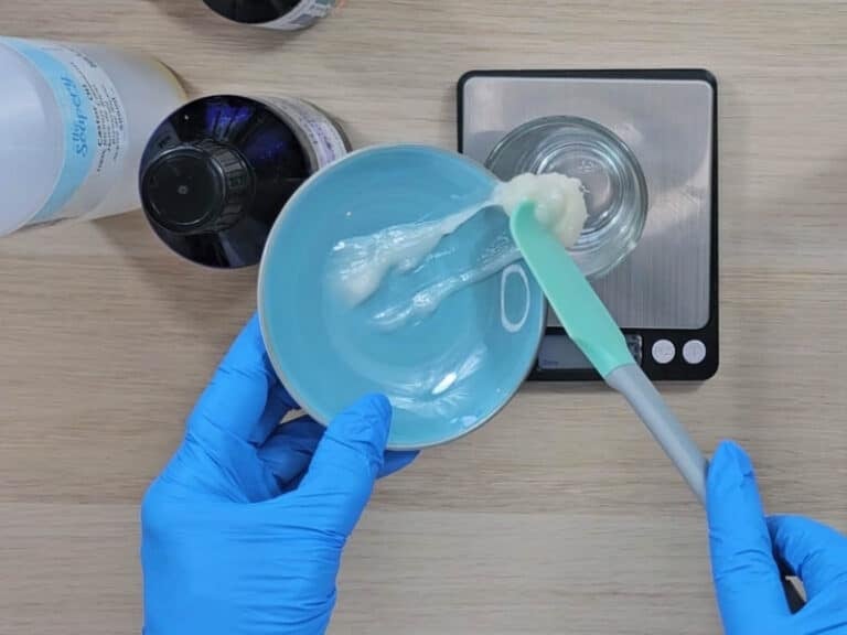 Coconut oil is measured into a beaker