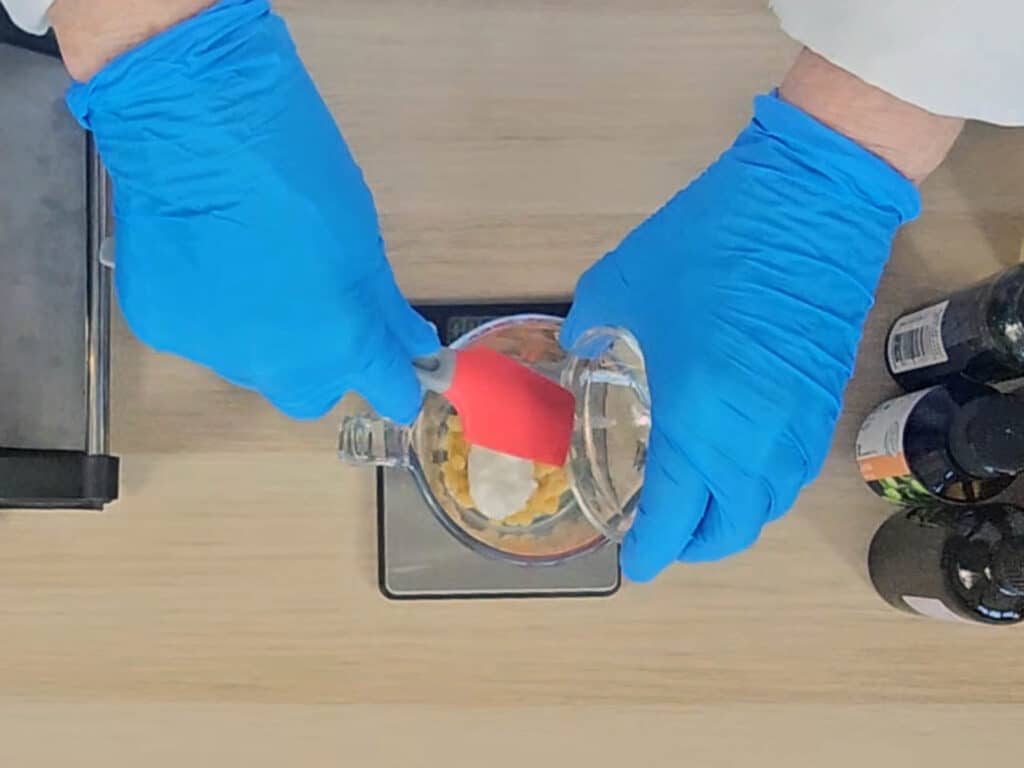 The solid lipids are weighed into a heatproof container