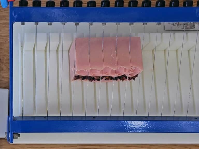 The soap is cut with a soap cutter The soap is cut with a soap cutter