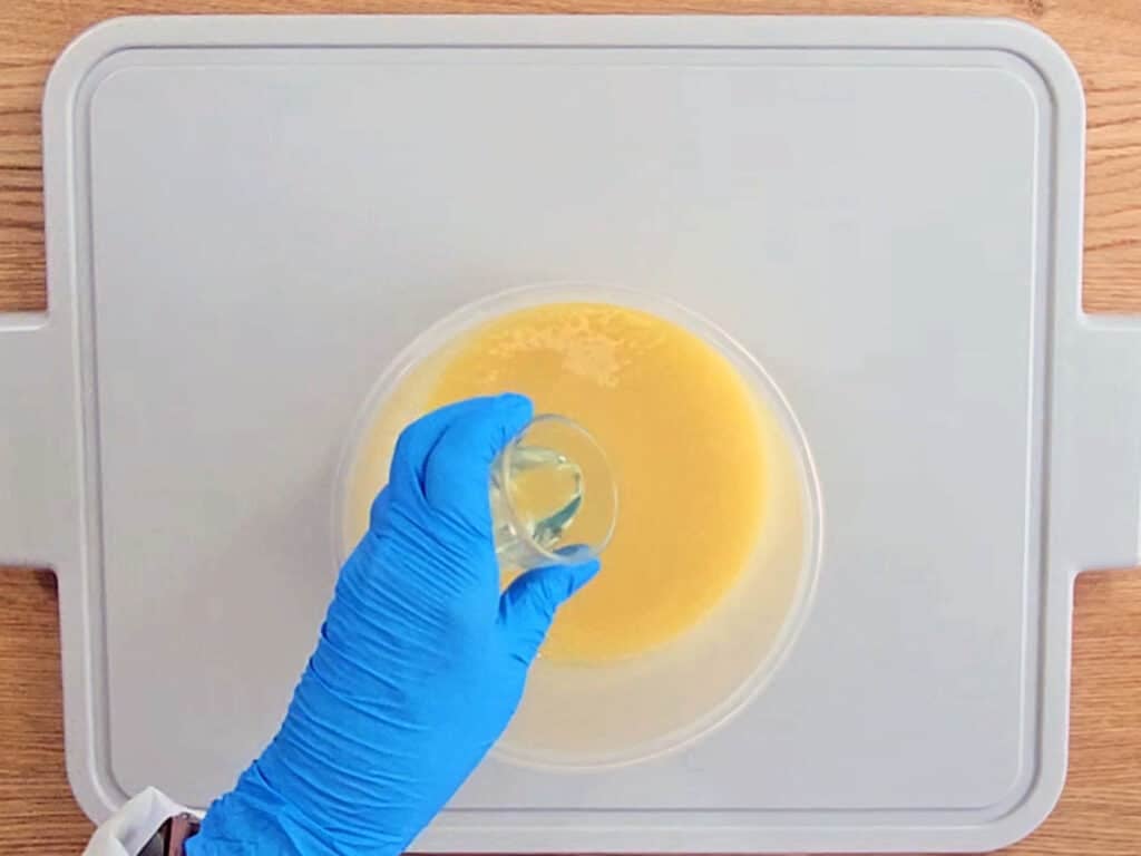 The aromatic oils are added to the soap batter