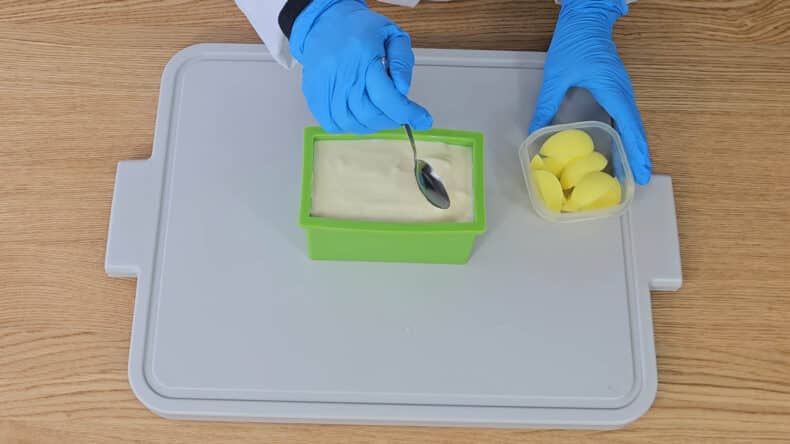 use a spoon to texture the top. You can create swirls, peaks, or waves depending on the look you want.