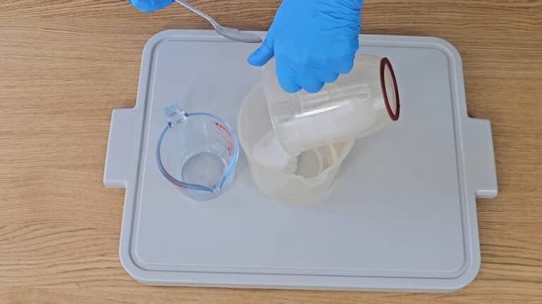 When you’re ready, carefully pour your lye crystals into the water. When you’re ready, carefully pour your lye crystals into the water.