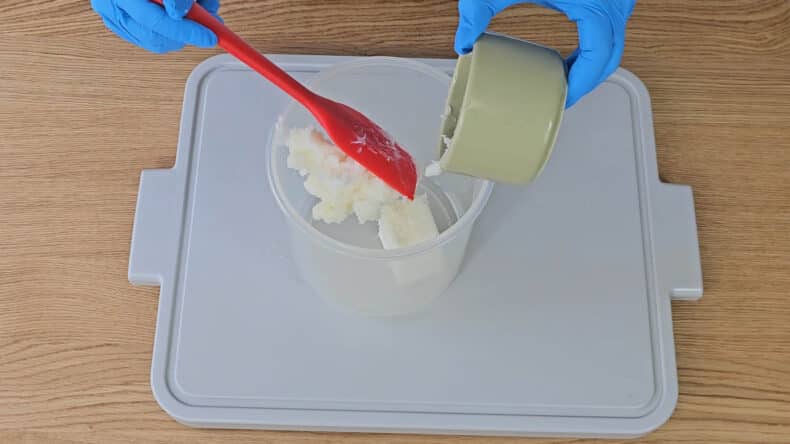 Weigh your coconut oil and Tallow into a good-sized heat proof container.