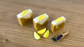 A cheerful homemade lemon poppy seed soap bursting with natural citrus scent and gentle exfoliation.