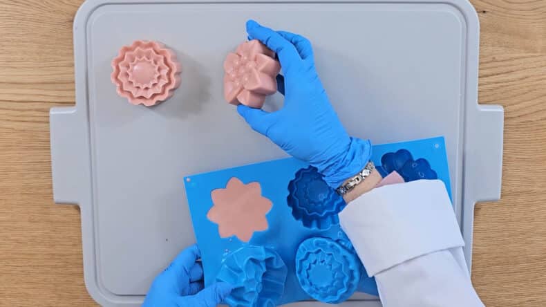 Leave the soap for a couple of hours to harden before removing it from the mold