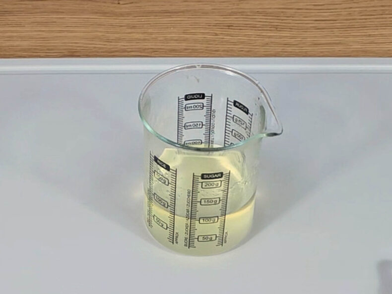 Once the oils have melted, remove the container from the water