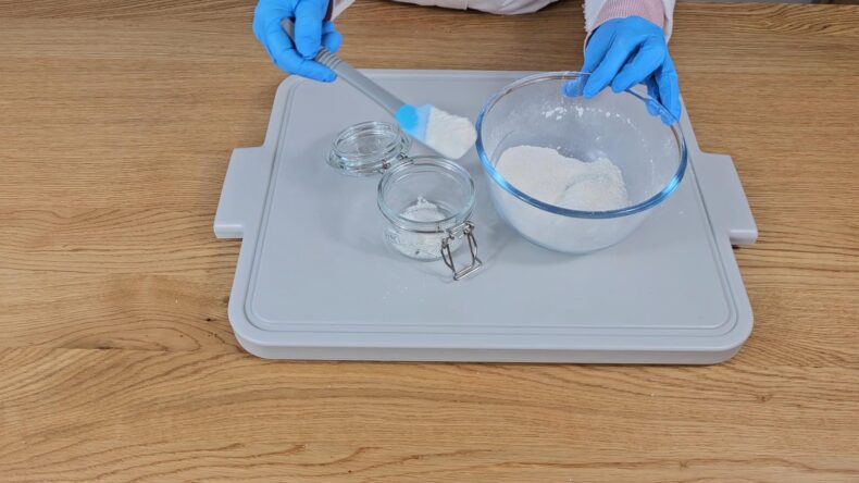 Transfer homemade face wash to a jar with a scoop ready for use