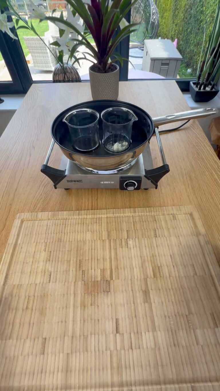 Lower bother beakers into a waterbath