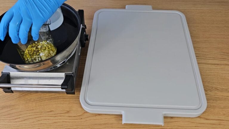 Place both beakers into the water bath Place both beakers into the water bath