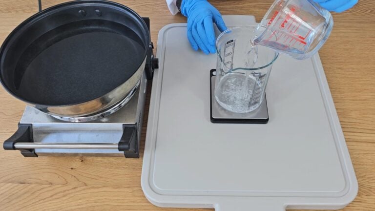 Place the distilled water and glycerin into one of the heatproof beakers