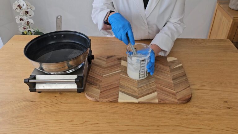 change to a spatula and continue to stir by hand while the lotion is cooling