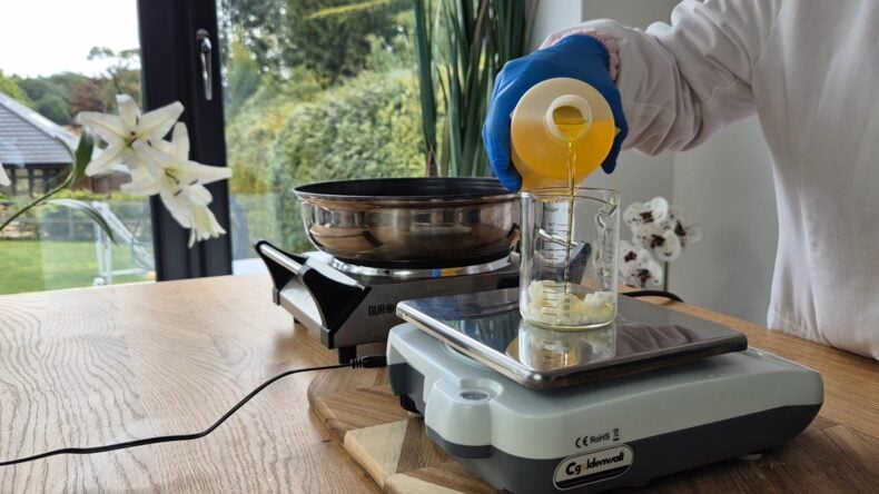weigh the jojoba oil